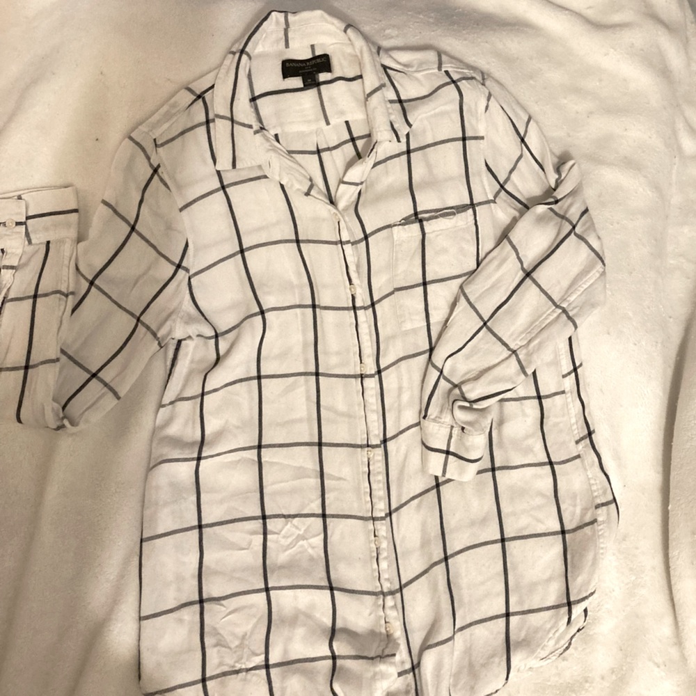 Banana Republic fit button down. White shirt featuring a black plaid pattern.